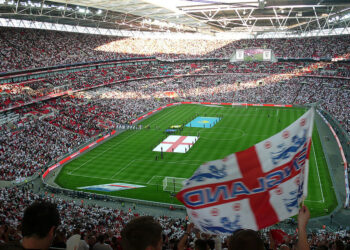 Stade de football, qui représente l'histoire du football