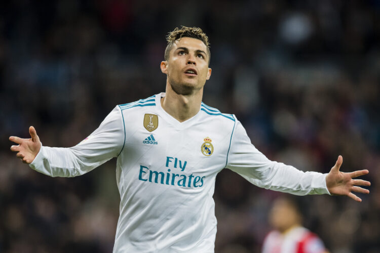 MADRID, SPAIN - MARCH 18: Cristiano Ronaldo of Real Madrid celebrates after scoring his goal during the La Liga 2017-18 match between Real Madrid and Girona FC at Estadio Santiago Bernabéu  on March 18 2018 in Madrid, Spain. (Photo by Power Sport Images/Getty Images)