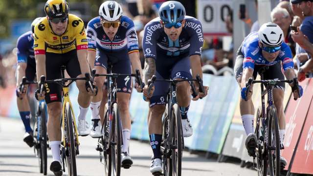 Australian Sam Welsford (C) of Team DSM wins ahead of Dutch Olav Kooij (L) of Jumbo-Visma and Belgian Jasper Philipsen (R) of Alpecin-Deceuninck compete during stage 4 of the Renewi cycling tour, from Beringen to Peer (179,4km) on August  26, 2023. The Renewi Cycling Tour takes place from August 23-27, 2023. (Photo by KRISTOF VAN ACCOM / Belga / AFP) / Belgium OUT