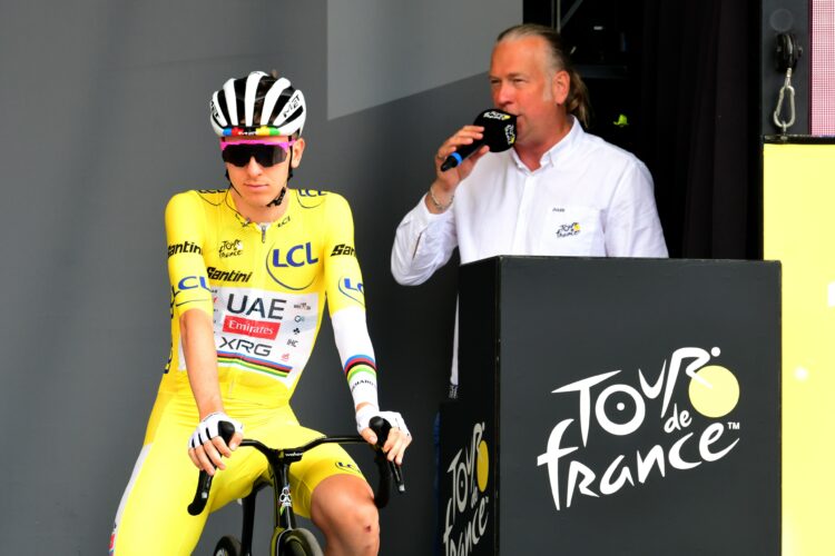 Yellow jersey winner Tadej Pogacar of UAE Team Emirates XRG during the official presentation of the professional cyclists on the podium at the start of stage 18 between Vif and Courchevel of the Tour de France on Thursday, July 24, 2025, in Vif.