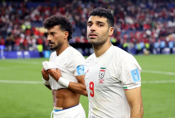 Ramin Rezaeian #23 et Mehdi Taremi #9 de la RI Iran