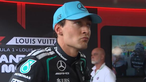 George Russell faisant la grimace dans une interview
