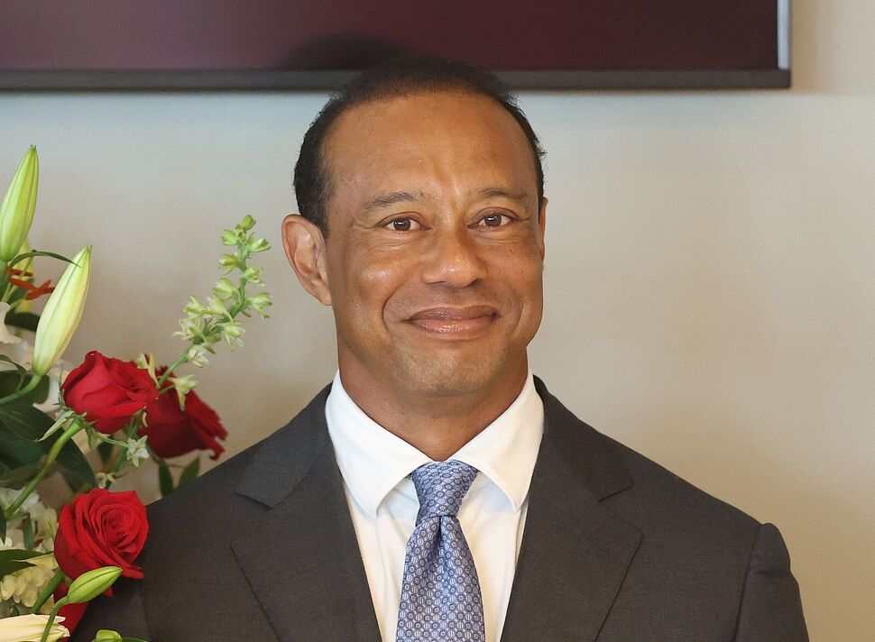 Tiger Woods sourit Tiger Woods sourit